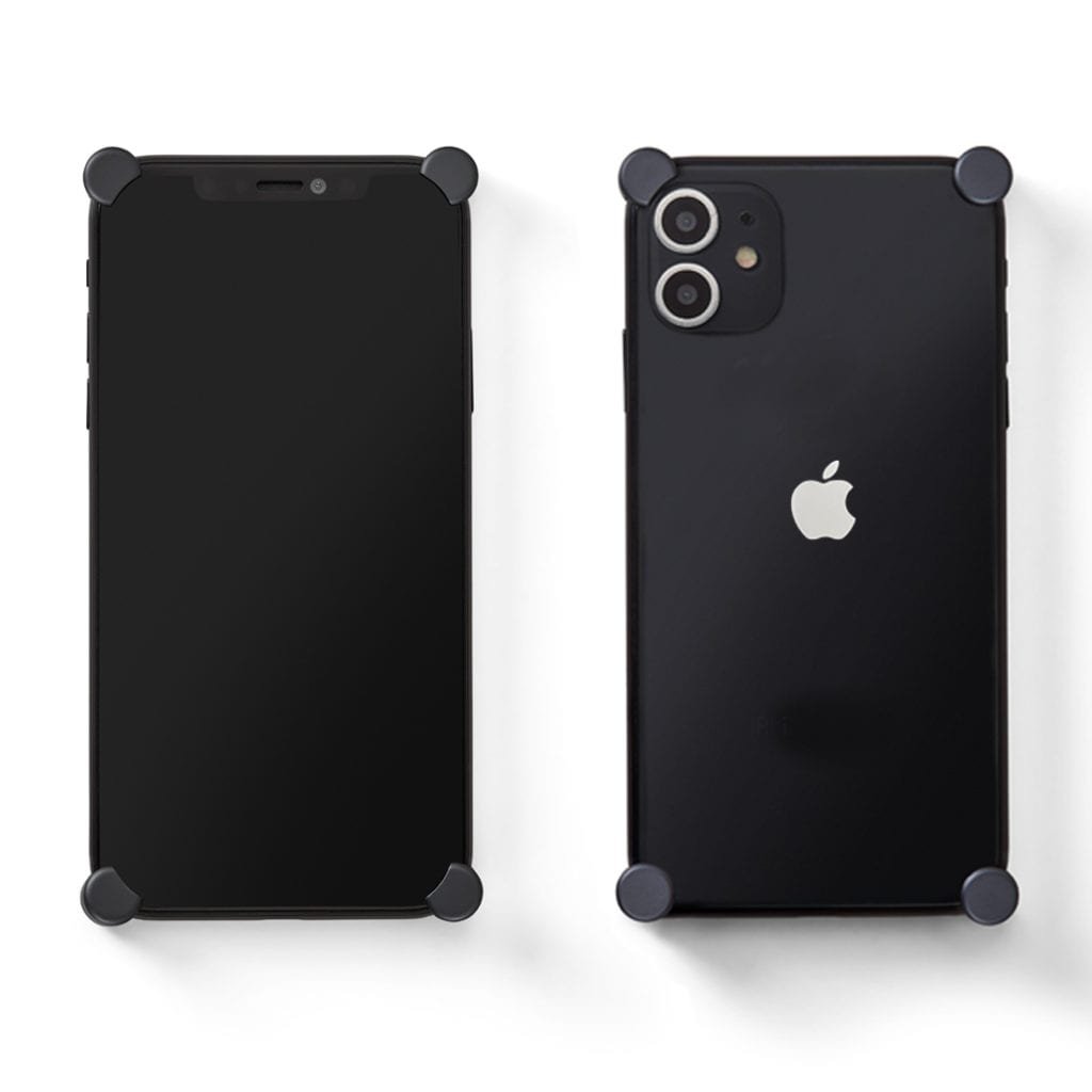 Carbon Original CORNERS installed on all four corners of a bare iPhone 11