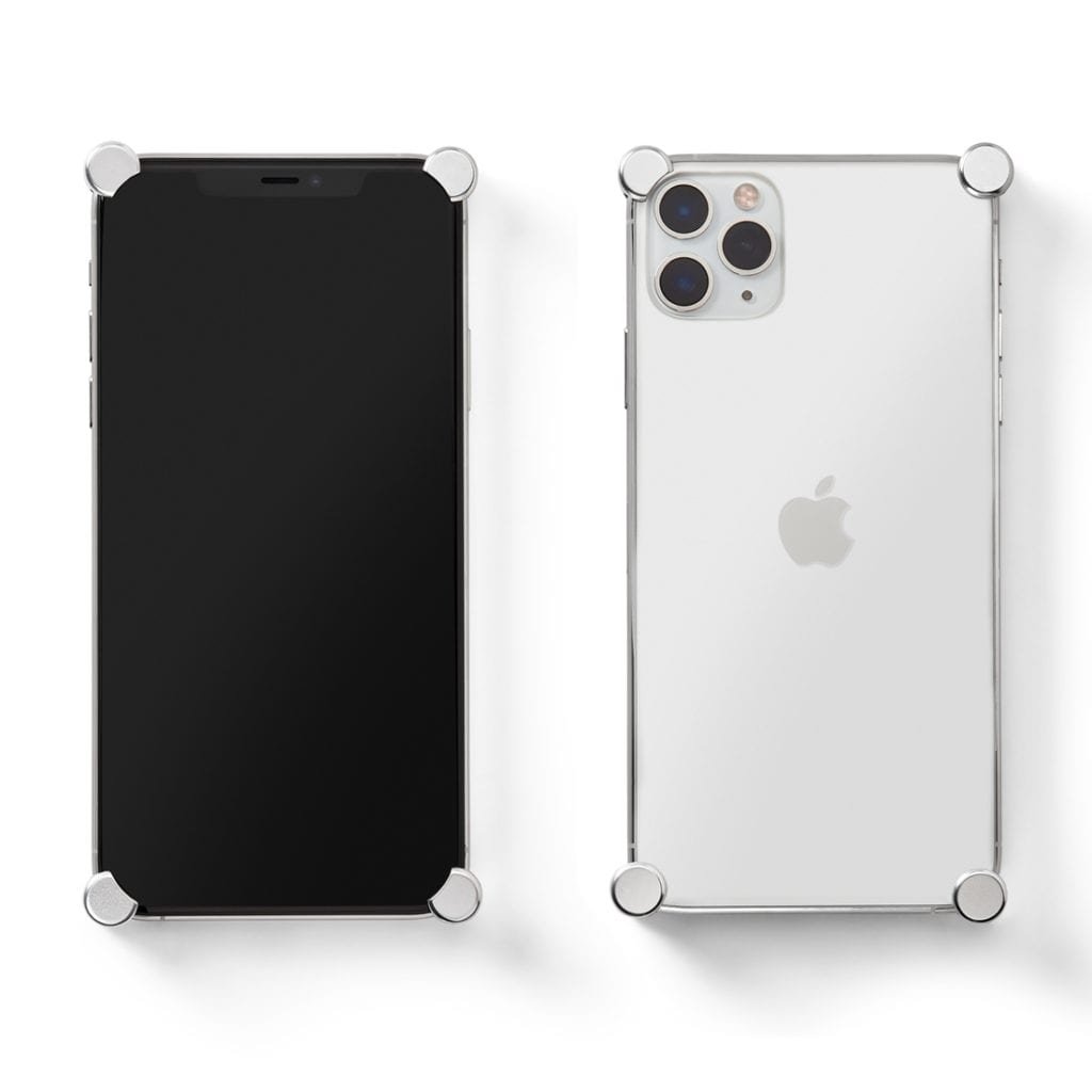 Silver Original CORNERS installed on all four corners of a bare iPhone 11