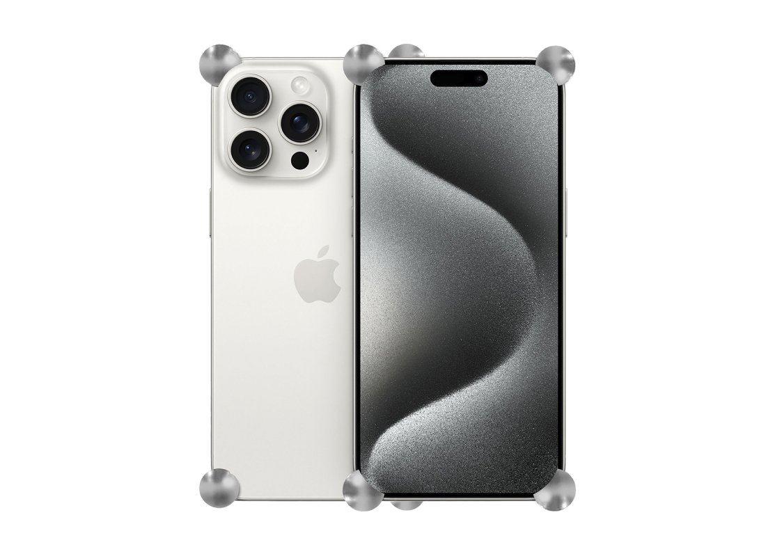 Silver Original CORNERS installed on all four corners of a bare iPhone 15 Pro / Pro Max